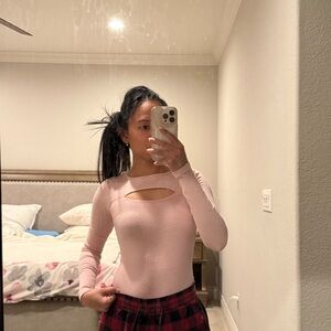 Pink ribbed bodysuit with cutout details